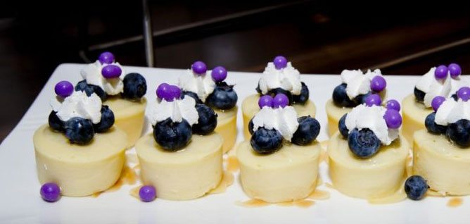 Cheesecake desserts with berries and cream. Cheesecake desserts with berries and cream.