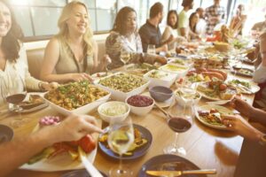 Group meal at a long table.