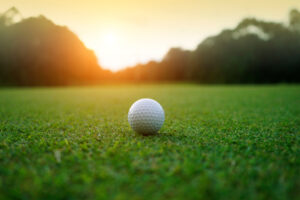 close up of golf ball on green