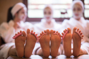 Women getting a pedicure: activities for ladies get together