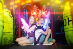 Family playing laser tag: indoor activities Myrtle Beach