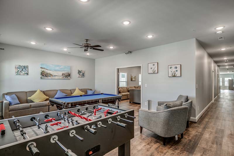206 54th Ave N - parlor room with pool table and foosball.